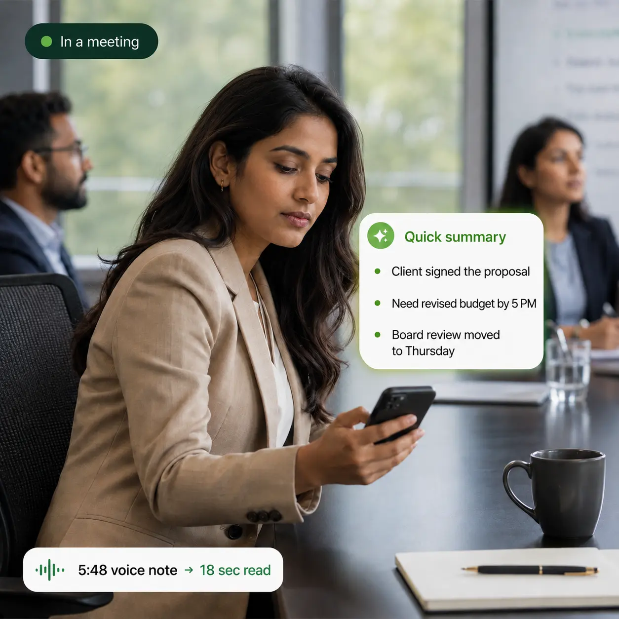 Professional reading a voice-note summary on WhatsApp during a meeting